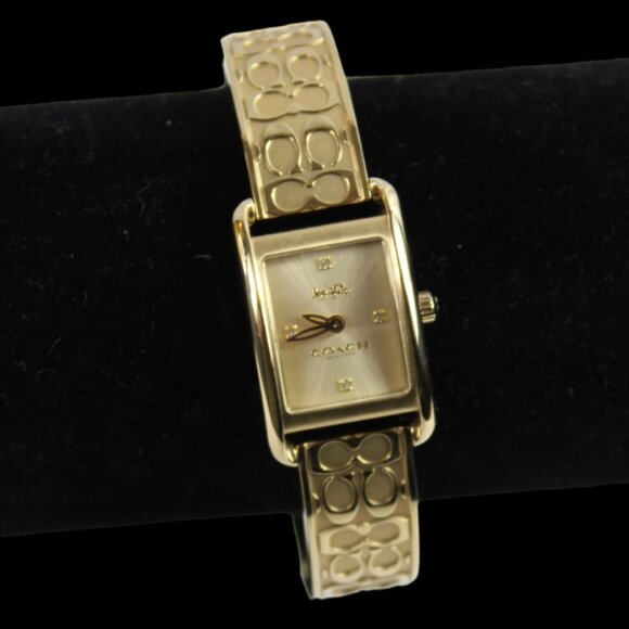 Coach Accessories - Coach Allie Gold Tone Etched Logo C Beveled Rectangle Face Bracelet Watch